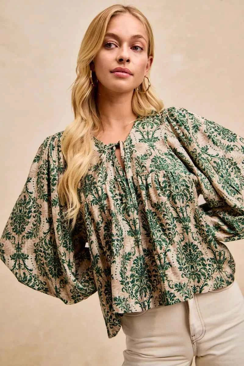 BiBi Printed Woven Front Tied Blouse with Baloon Sleeve 8e45fbad77424247b1f7850d8ce99f6c-Max-Origin