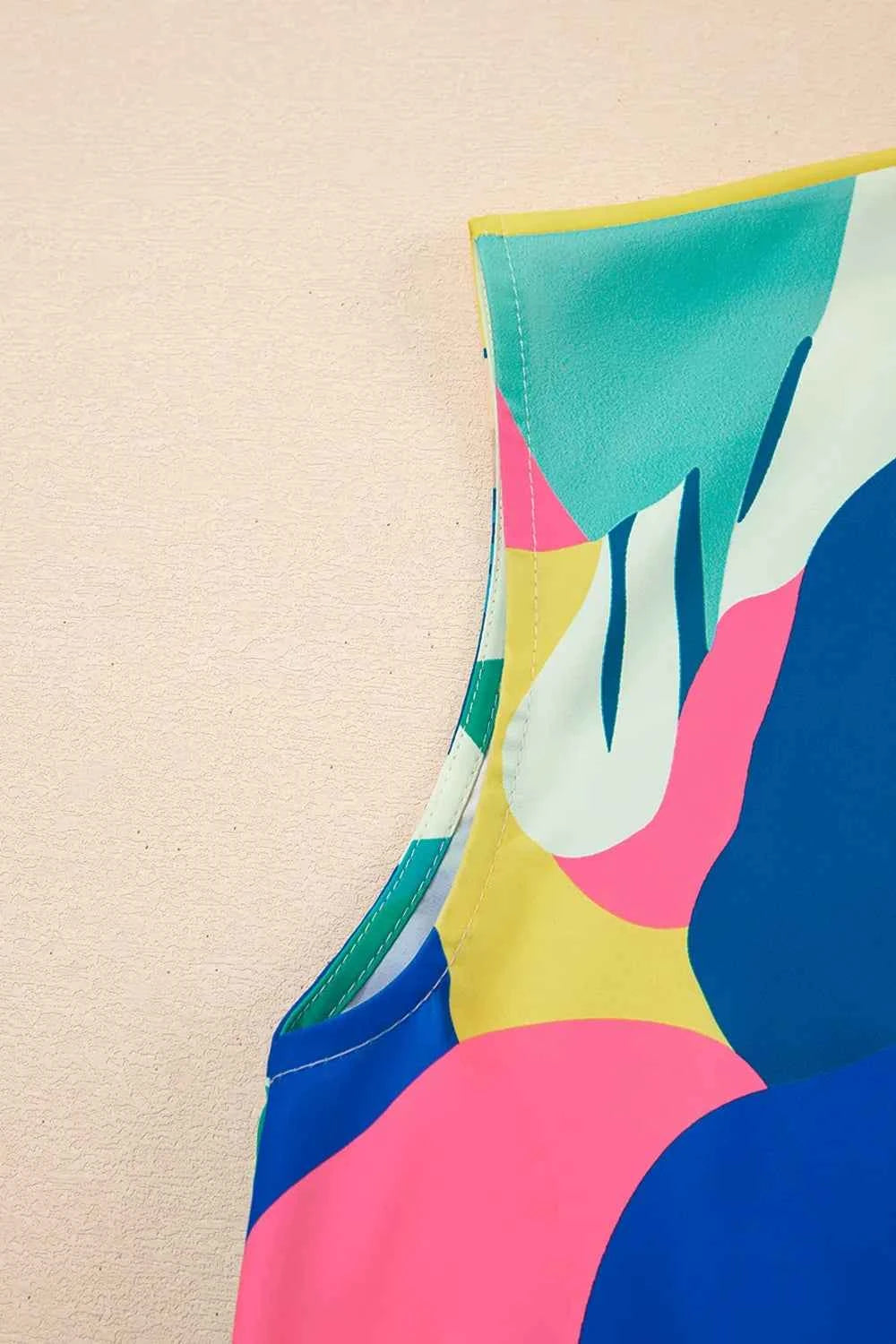 Abstract Print Cap Sleeve Pocketed Mini Dress 9044e6aa-0a55-4f4b-bf1c-ac42c6b5975b-Max-Origin