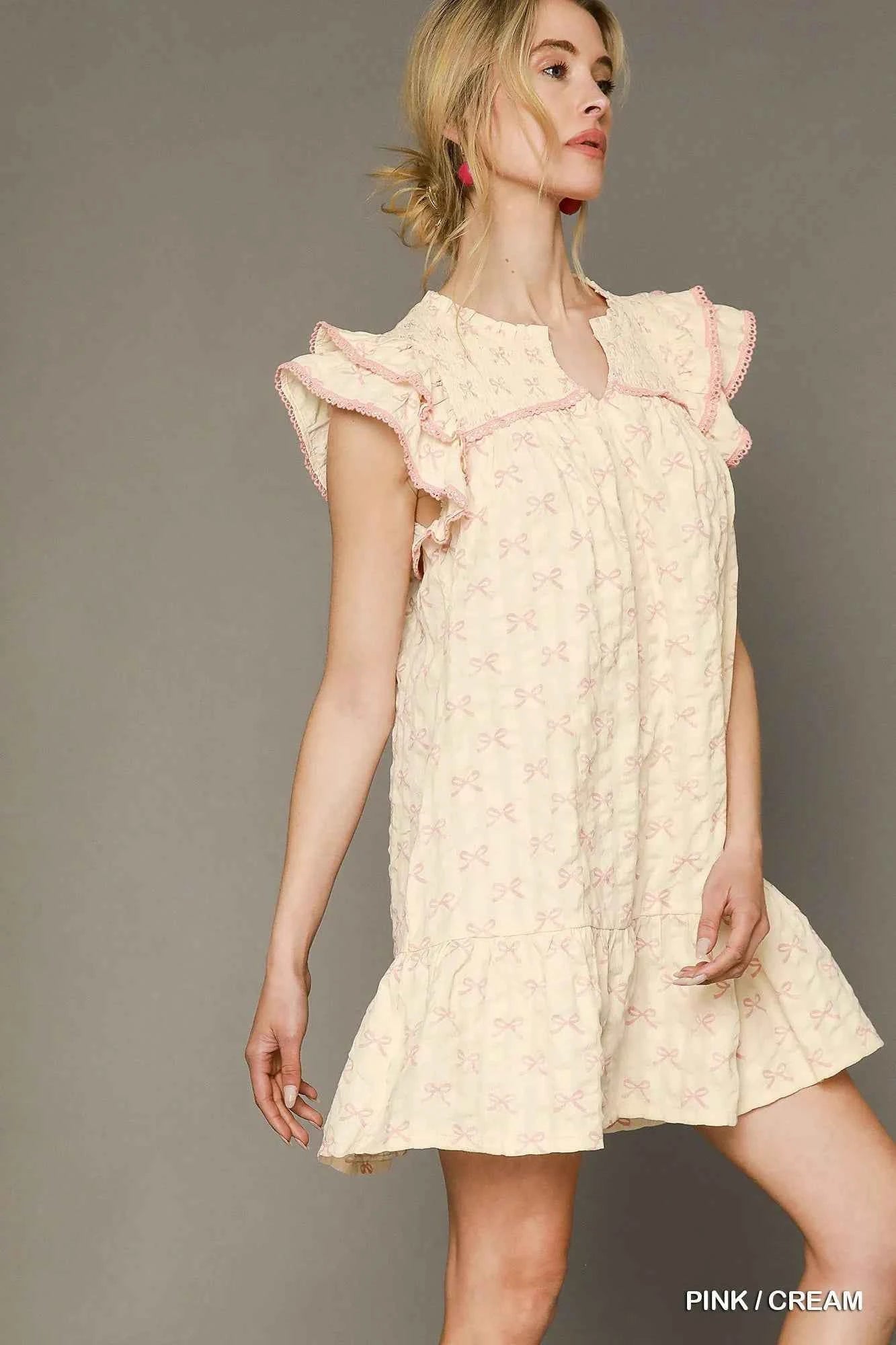 Umgee Bow Print Ruffled Cap Sleeve Mini Dress 9074f585-9930-454d-b42f-cbb794f05746-Max-Origin