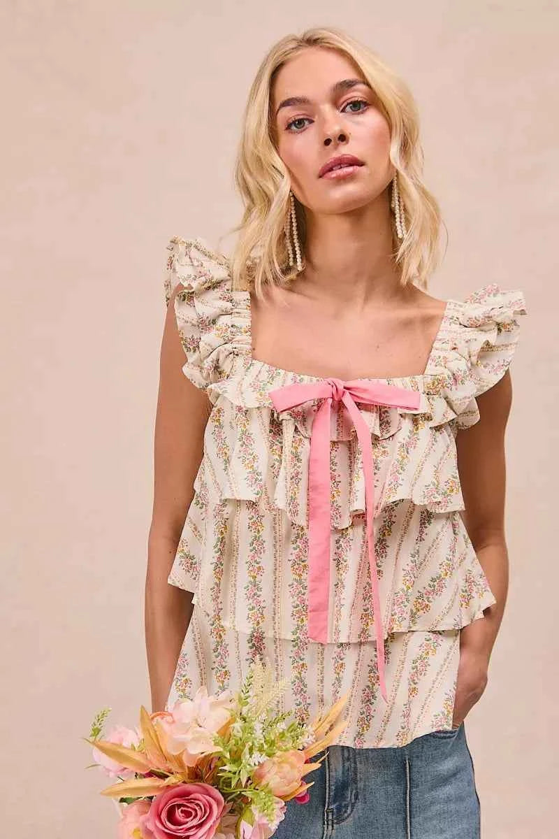 BiBi Floral Printed Woven Front Bow Tied Ruffled Square Neck Sleeveless Top 933e608174a44be6b31d8f6dc8d32f94-Max-Origin