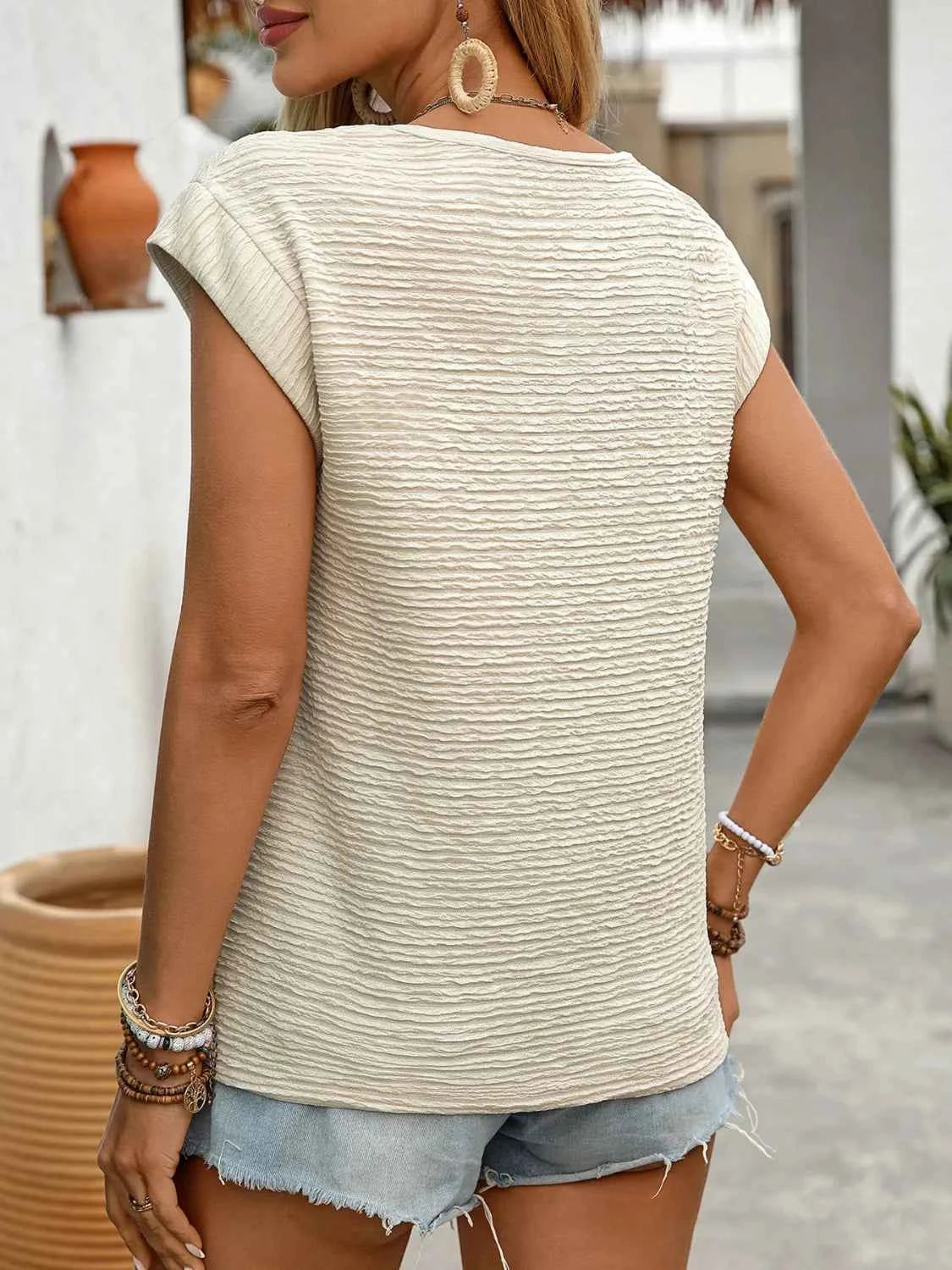 Asymmetrical Short Sleeve Top 9393effc-56e1-4062-9dbb-72927f62edcd-Max-Origin