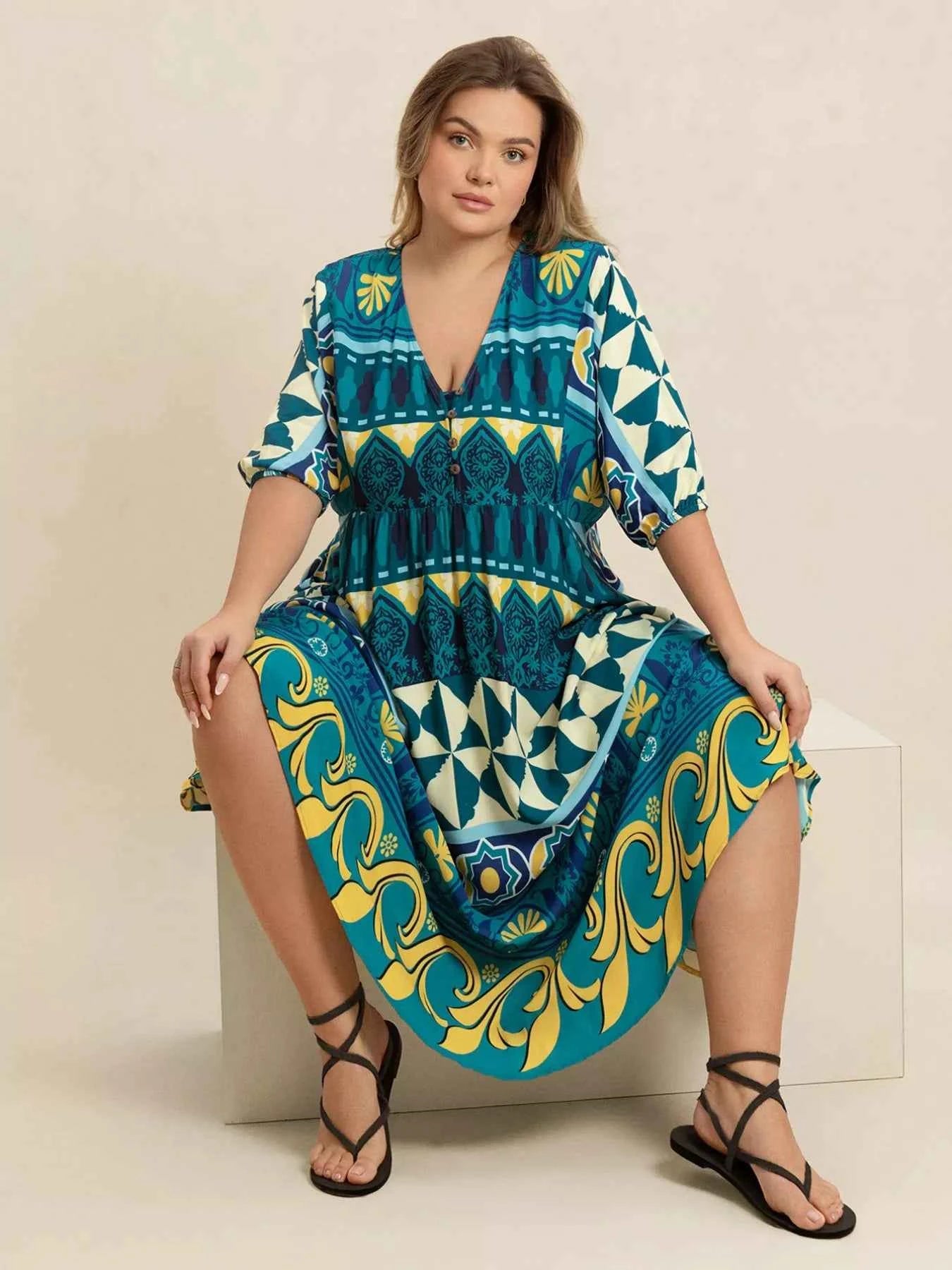 Plus Size Printed V-Neck Half Sleeve Midi Dress 9551220e-1eae-4157-a7e0-39b72be525d8-Max-Origin