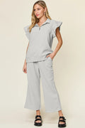 Double Take Texture Ruffle Short Sleeve Top and Drawstring Wide Leg Pants Set Light Gray 95a9c2aa-91fb-4a74-bbf0-adc03724c08d-Max