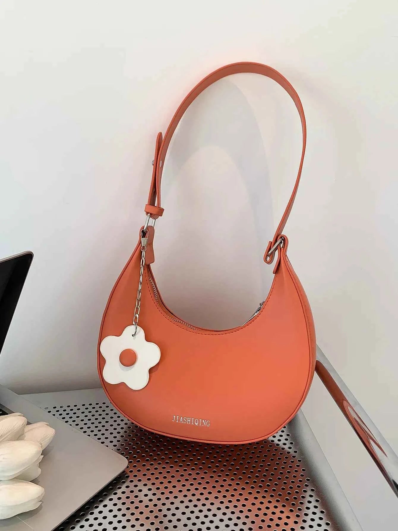 Crescent Shoulder Bag with Flower Charm Orange onesize 95f3c5b401bf485995e7ea5c2d9ad4af-Max-Origin