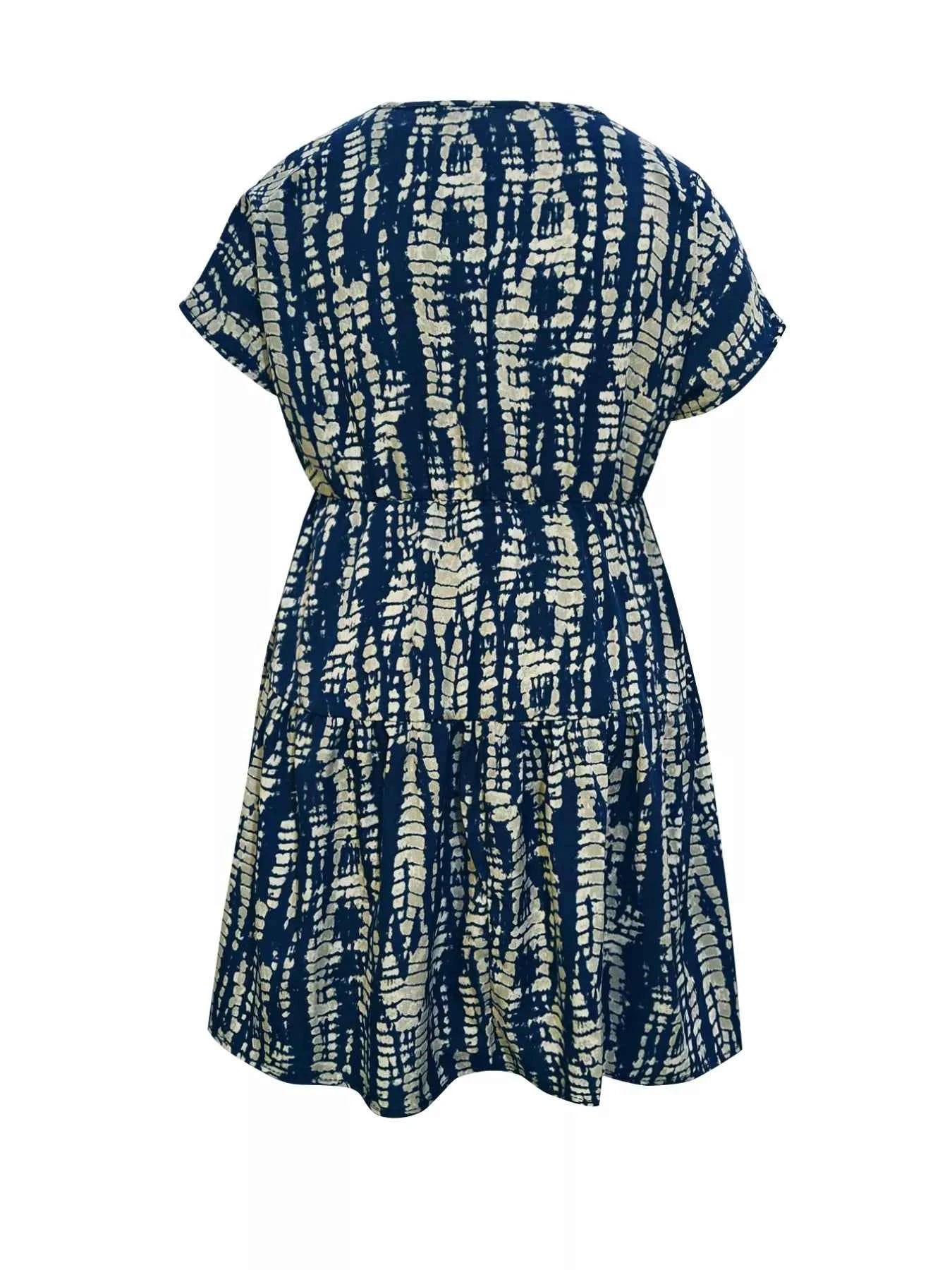 Plus Size Printed Long Sleeve Ruffle Hem Mini Dress 99b38138-2032-4033-ab14-793c86f1221e-Max-Origin