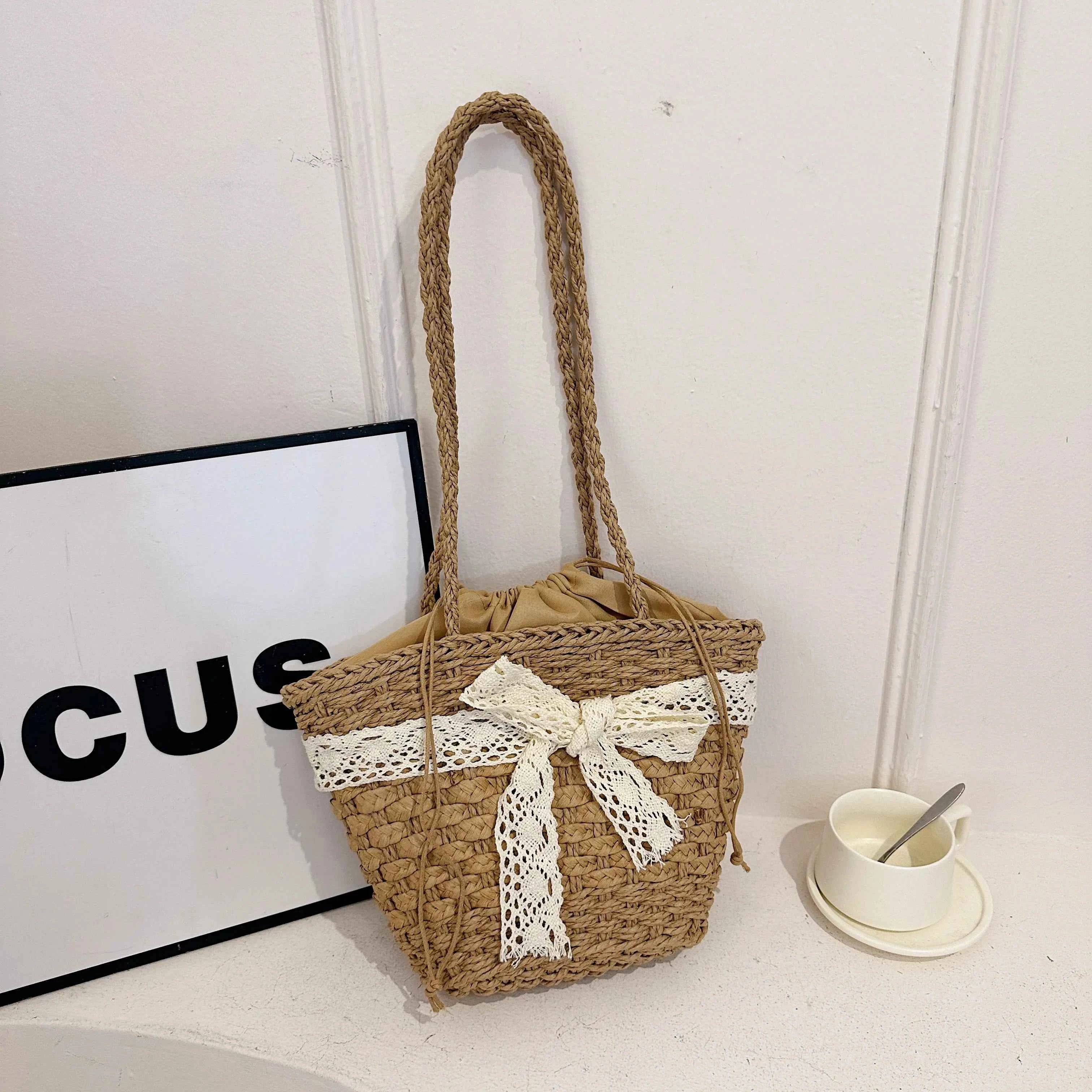 Drawstring Woven Straw Handbag 9dec5eba341840a49e148762818b5b73-Max-Origin