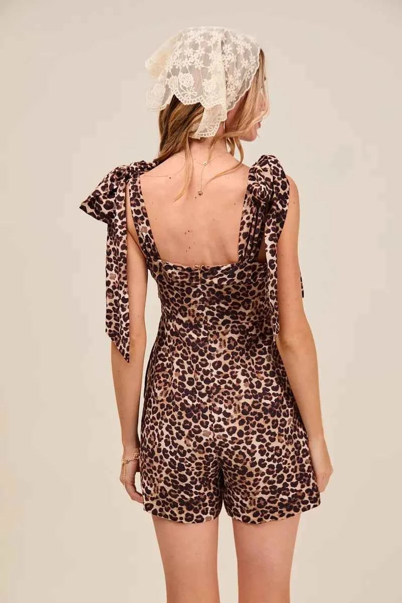 SO ME Leopard Flowy Woven Romper With Tie Straps 9e57af8c08d94be2a173ee1f25daccd0-Max-Origin