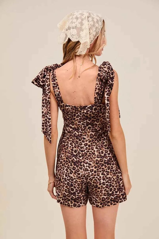 SO ME Leopard Flowy Woven Romper With Tie Straps 9e57af8c08d94be2a173ee1f25daccd0-Max-Origin