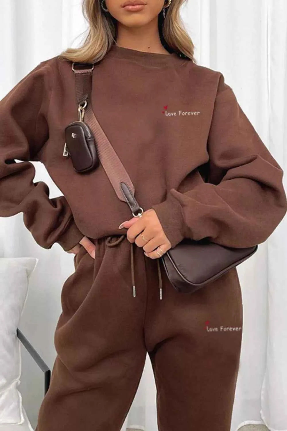 Round Neck Sweatshirt and Joggers Set 9fe41d8a-2ca5-4bdb-818f-79a2b8ea5fdc-Max-Origin