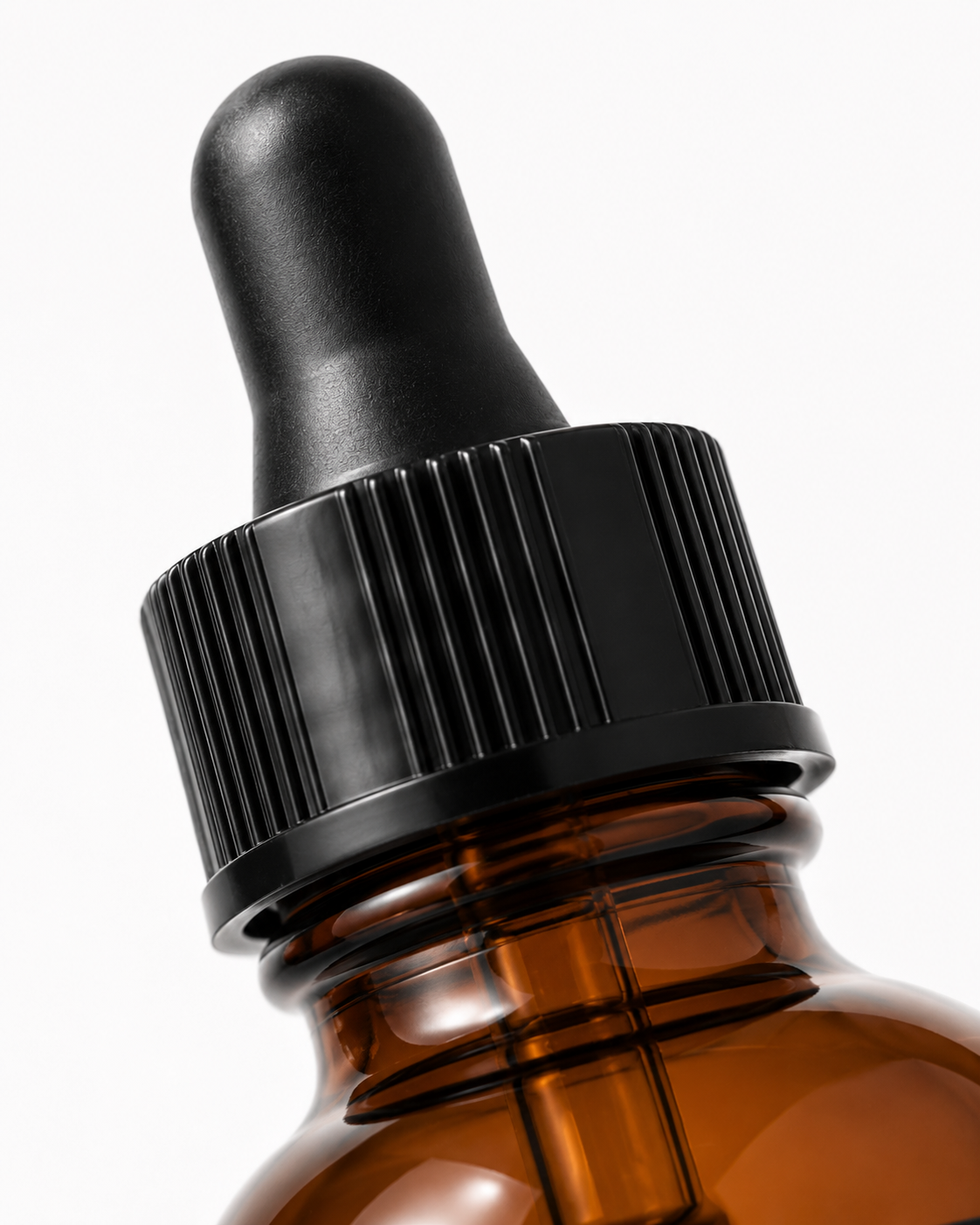 Radiance Face Oil | Rosehip & Moringa Facial Oil Amberdropperbottleclose-upinstudio