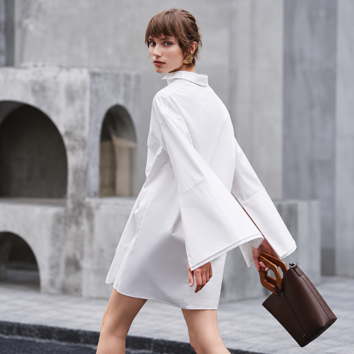 The Relaxed Single-Breasted Shirt Dress ArchitecturalWhiteShirtDressPortrait