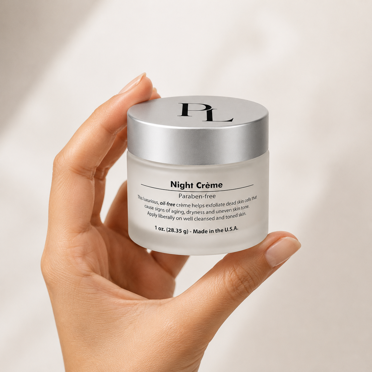 Night Renewal Face Cream | Overnight Moisturizer Eleganthand-heldnightcremejar