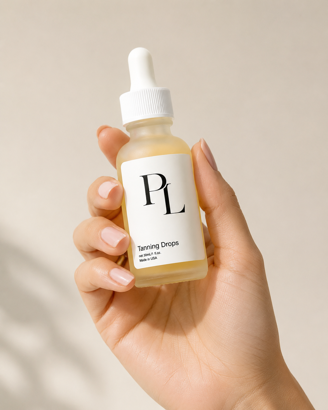 Self-Tanning Drops | Buildable Face & Body Glow Elegantskincarebottleinhand