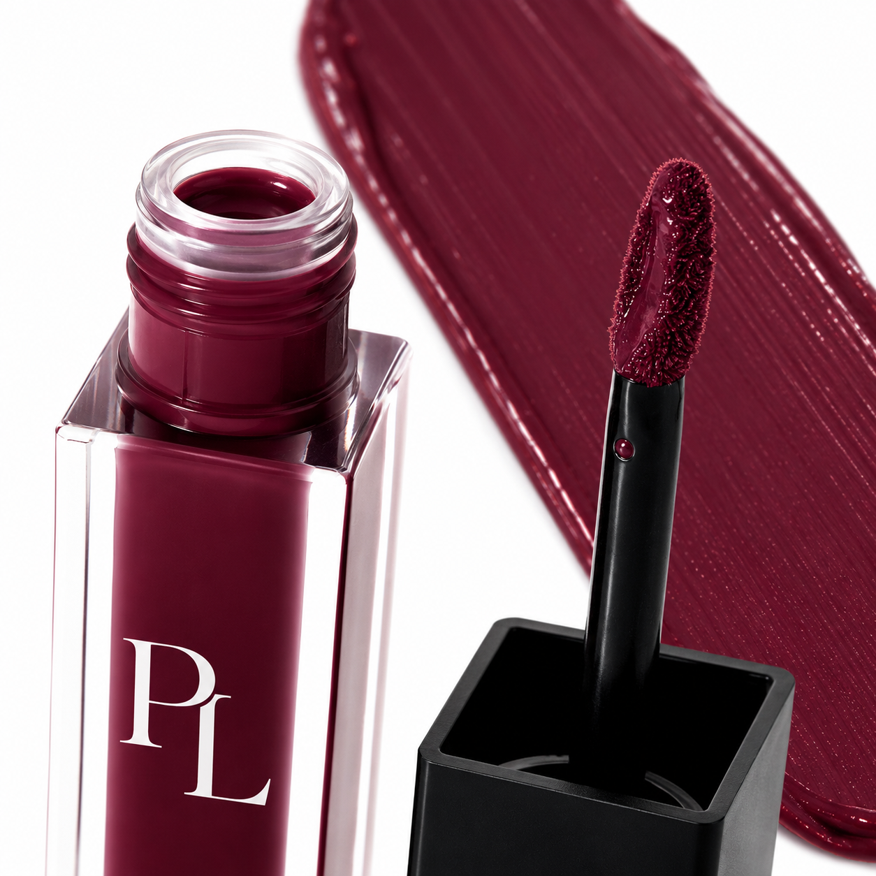 Matte Lip Stain - Outlandish Glossy_berry_lipstick_close-up_shot