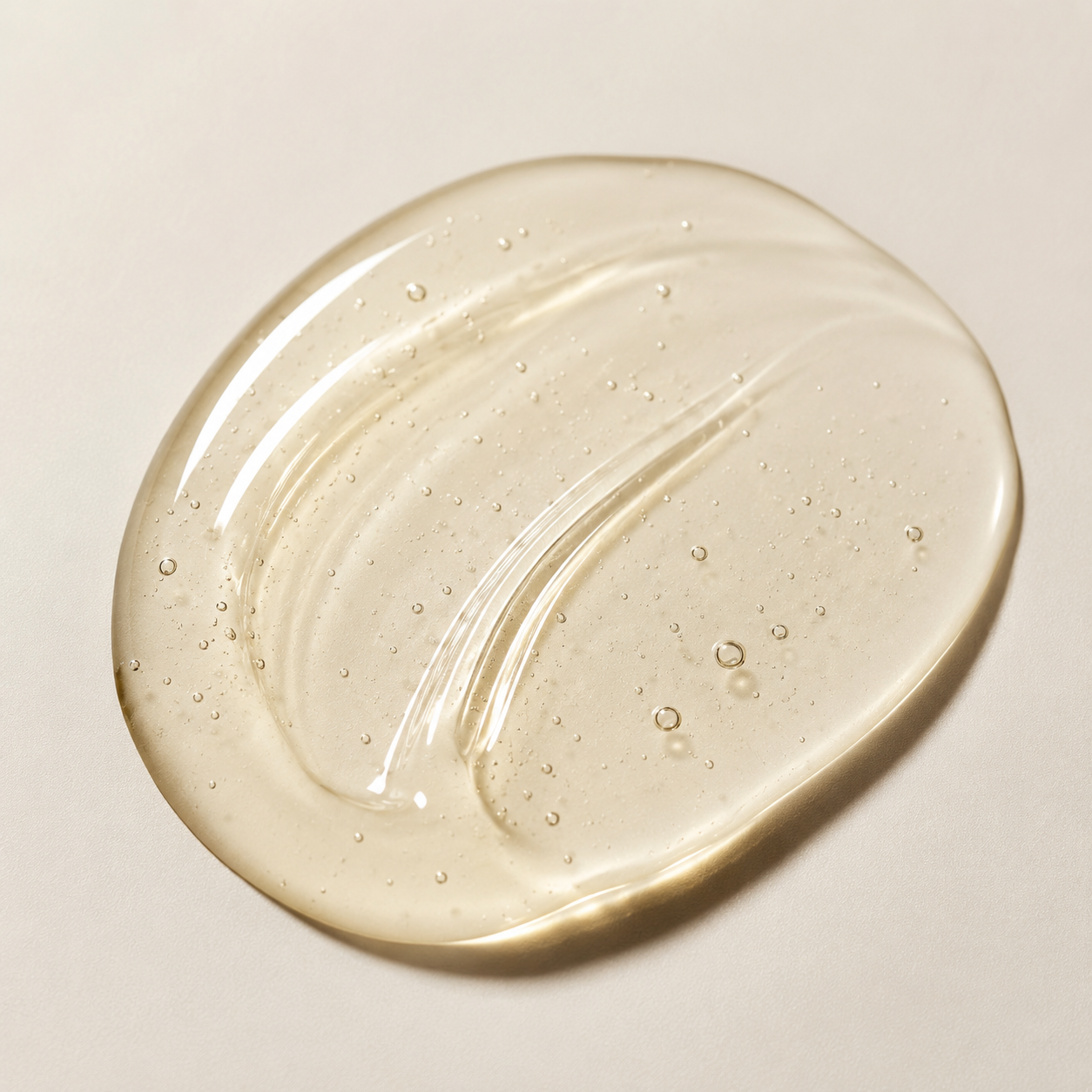Collagen & Retinol Serum | Firming & Hydrating Formula Glossy_serum_drop_on_cream_surface