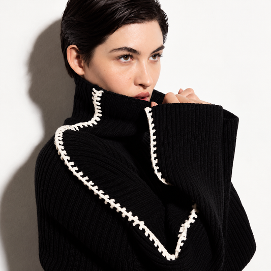 The Noir Pure Wool Relaxed Sweater High-Collar_Shadow_Portrait