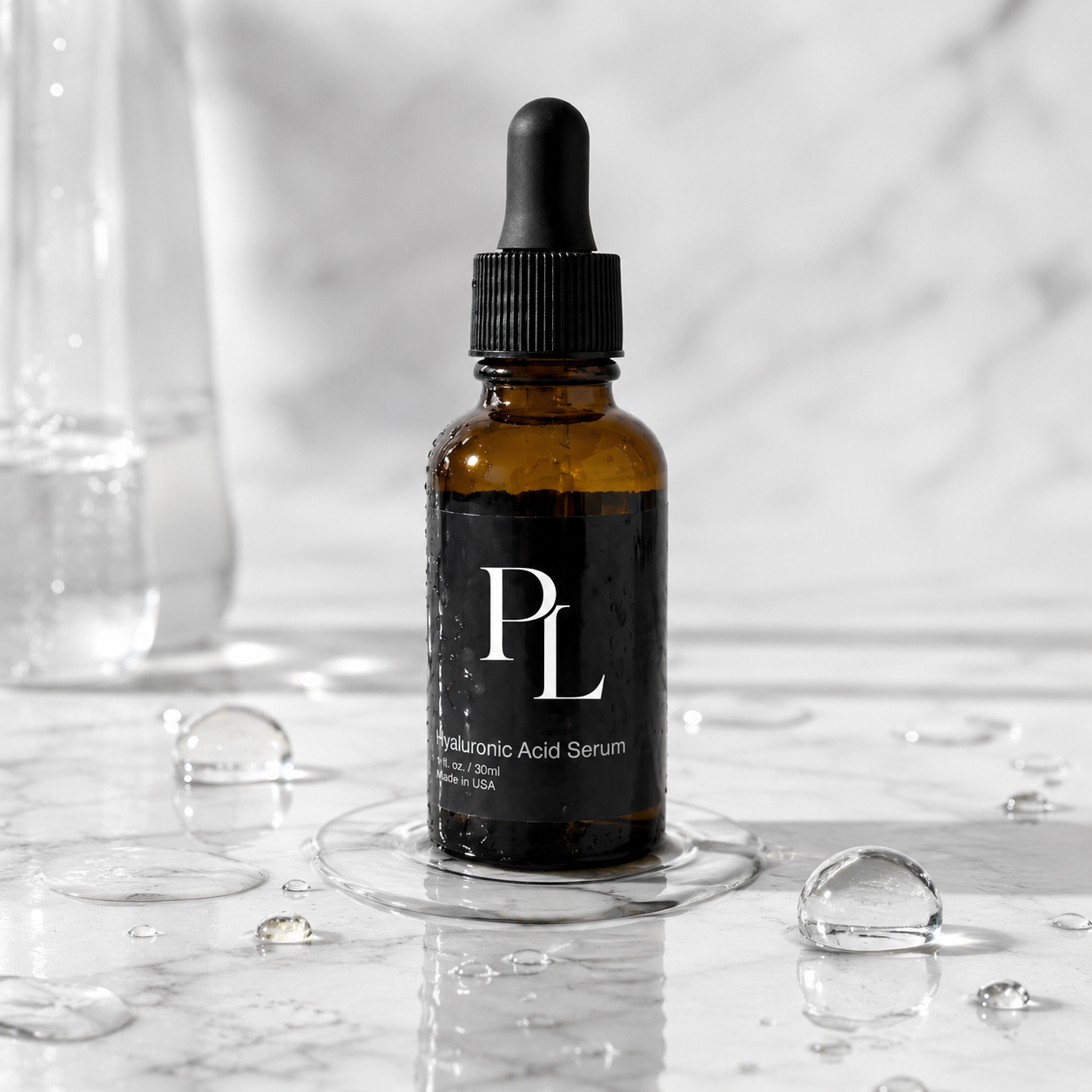 Brown glass bottle with black cap on a marble surface with water droplets, featuring the brand 'PL'.