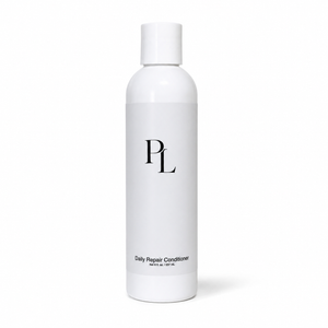 Daily Repair Conditioner Minimalistproductshotofconditionerbottle