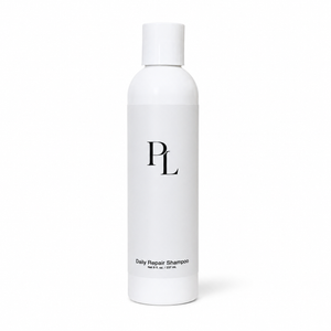 Daily Repair Shampoo Minimalistshampoobottleonwhitebackdrop
