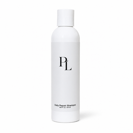 Daily Repair Shampoo Minimalistshampoobottleonwhitebackdrop