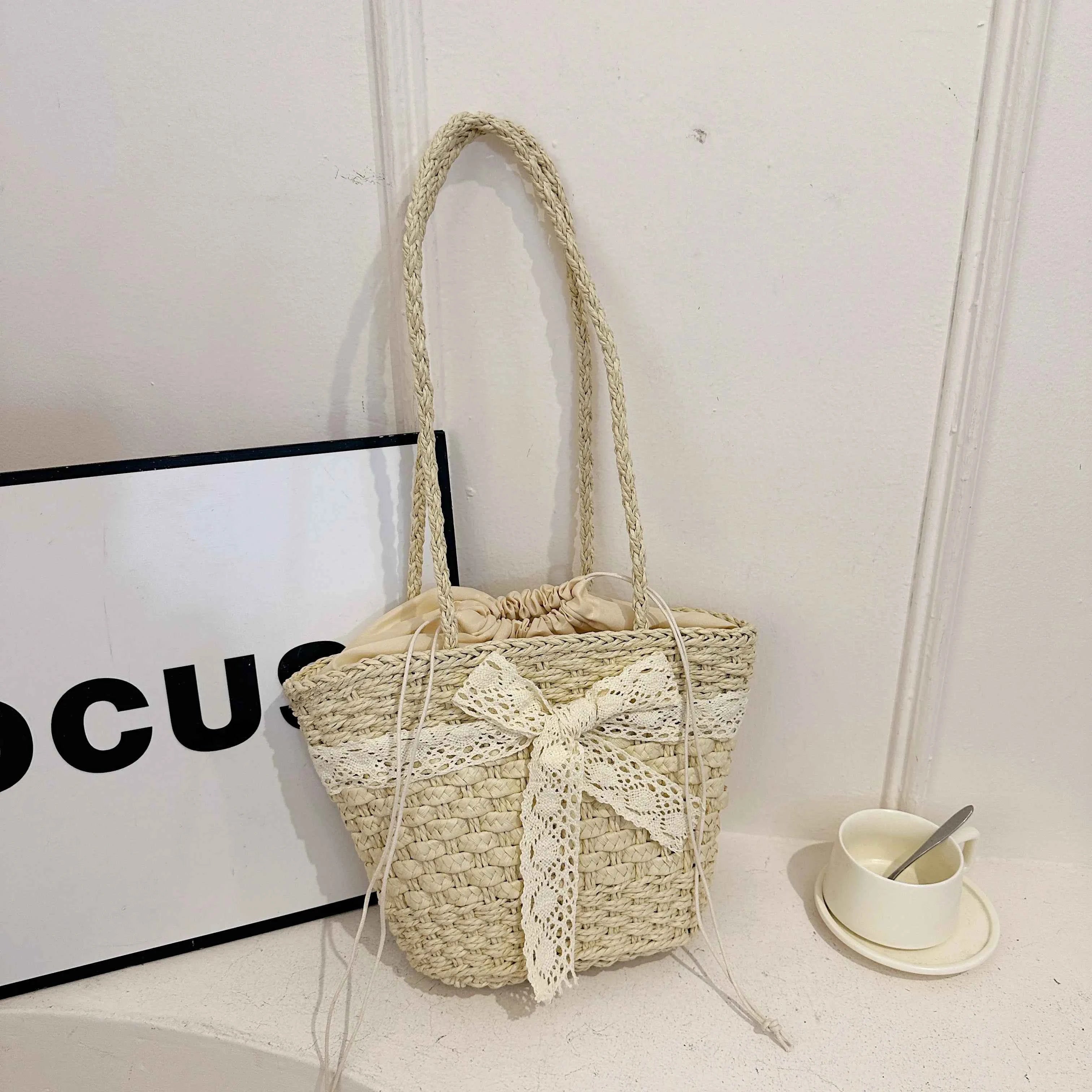 Drawstring Woven Straw Handbag a29b68ca2c1f4901940009541729e811-Max-Origin