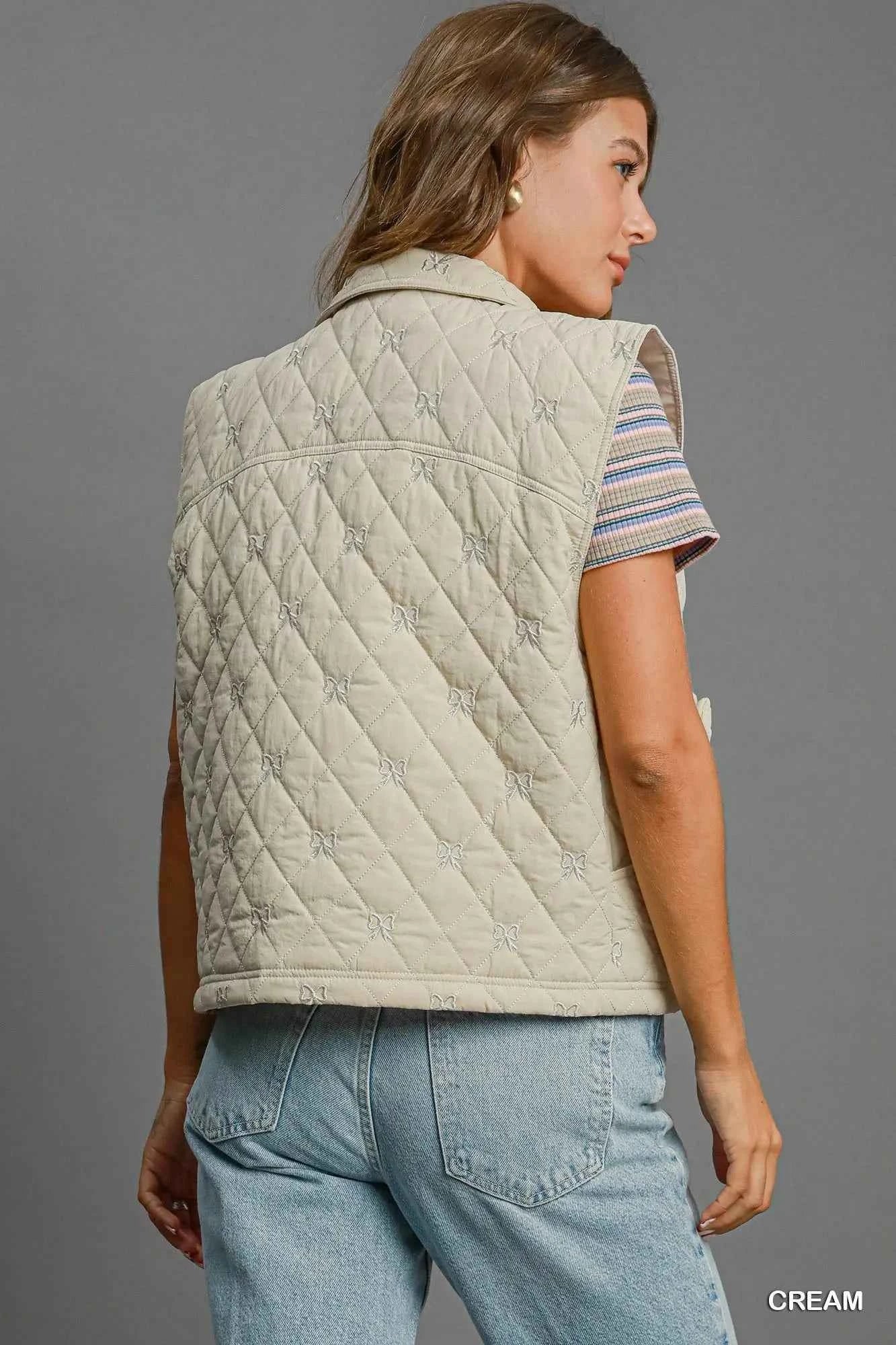 Umgee Sleeveless Quilted Vest with Bow Details a2a24d98-bba3-4dcc-9d17-2a0cca2b4295-Max-Origin