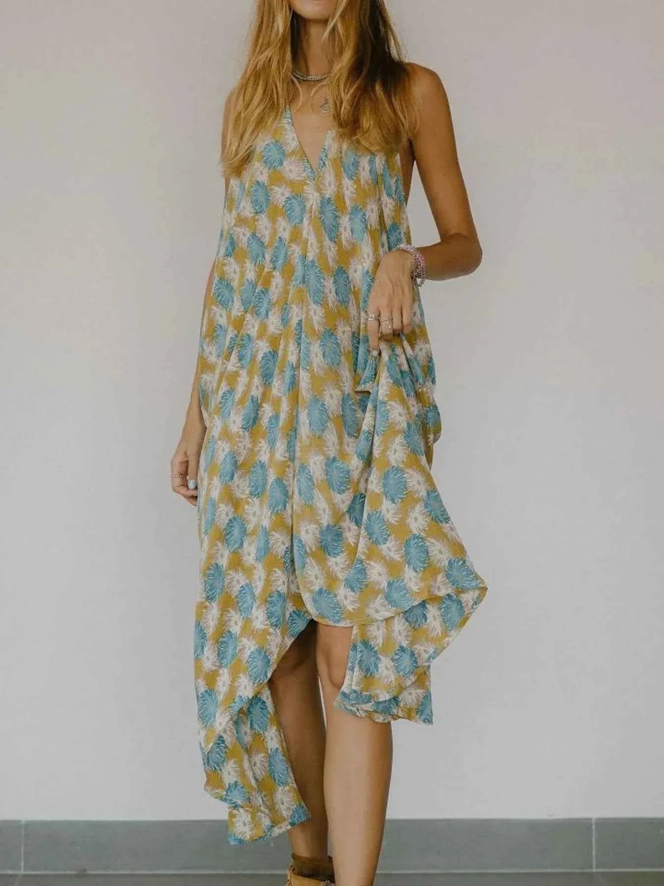 Asymmetrical Hem Printed Halter Neck Dress a30d2b71-b4e9-46c2-9751-e40520756218-Max-Origin