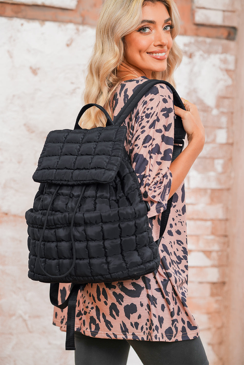 Black Solid Flapped Quilted Puffer Backpack a349c6db693f9cf2