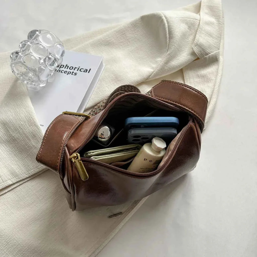 Leather Shoulder Bag with Woven Strap a679a8dc30c6492ab015678125669d86-Max-Origin