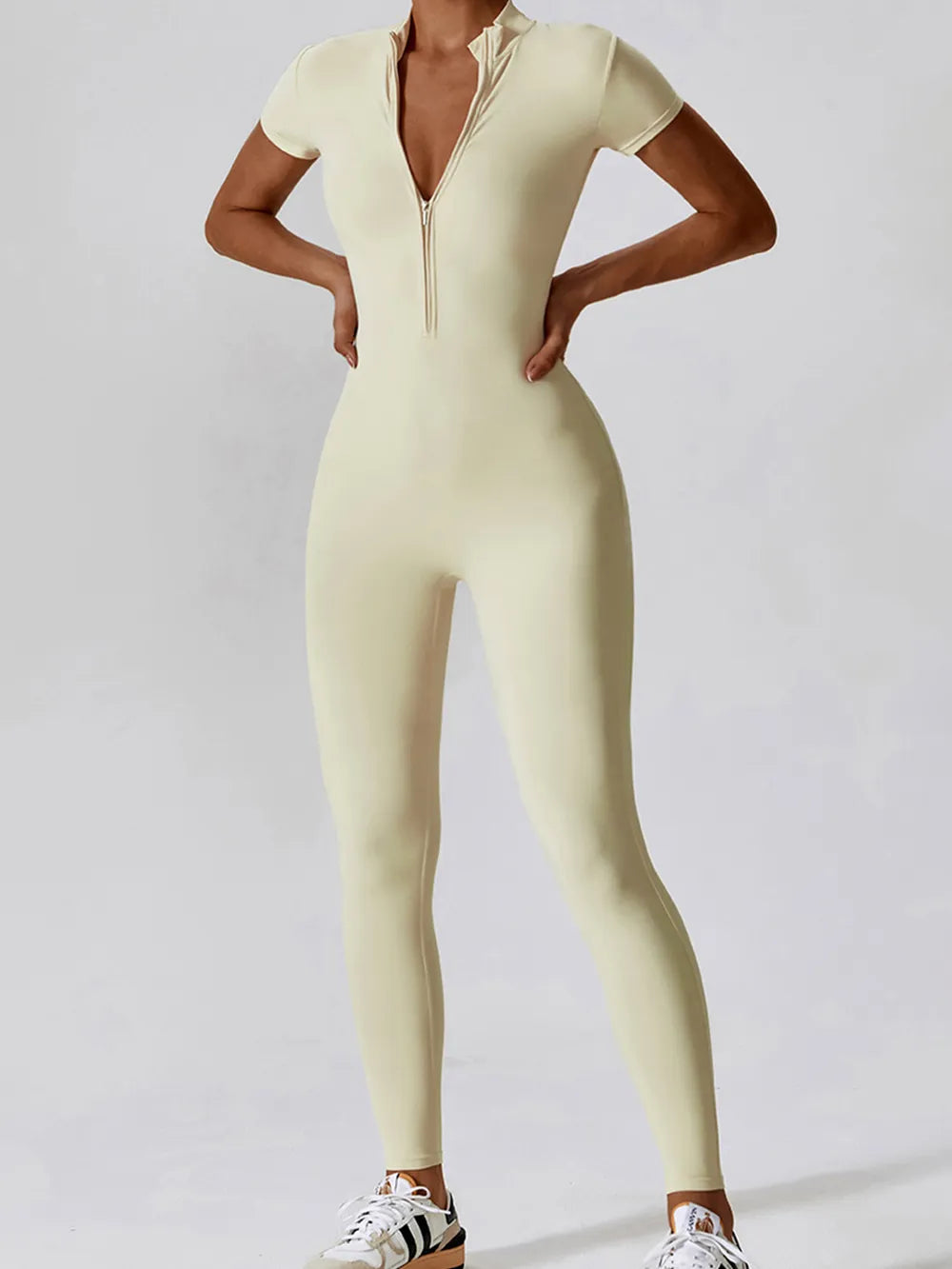 Basic Bae Half Zip Short Sleeve Active Jumpsuit a92ac476-a132-4d90-819a-f3a6c88a3512-Max