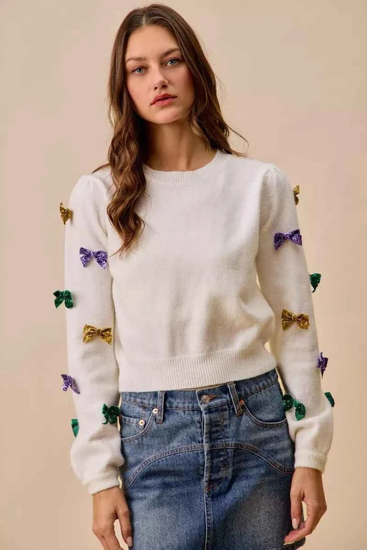 SO ME Mardi Gras Glitter Bow Ribbon Sweater Knit Top IVORY ab3eb3c65e234aae9d999139d82f1b2d-Max-Origin