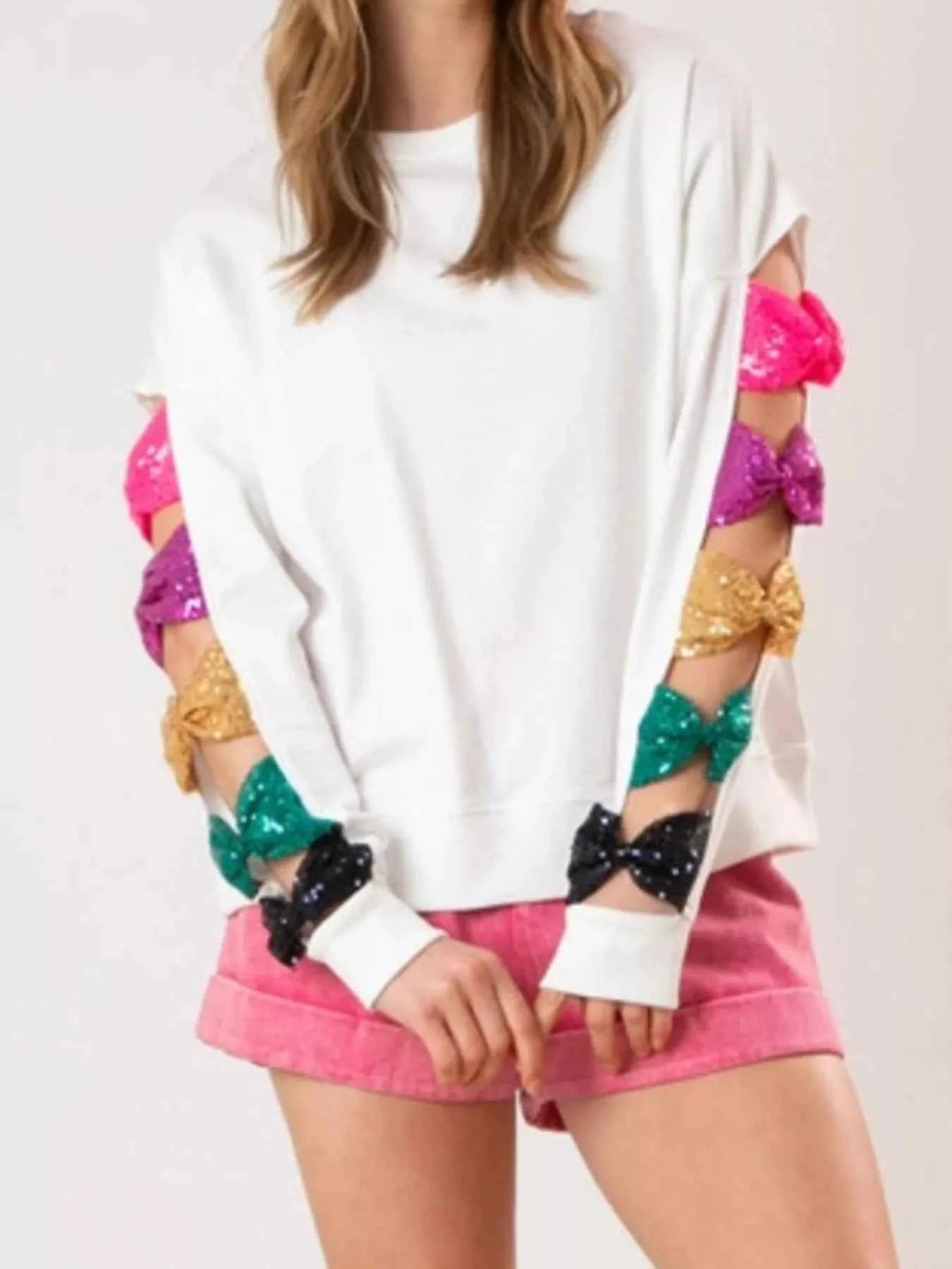Sequin Bow Cutout Round Neck Sweatshirt abf61384-9bf2-46c3-8c04-717a326fbe54-Max-Origin