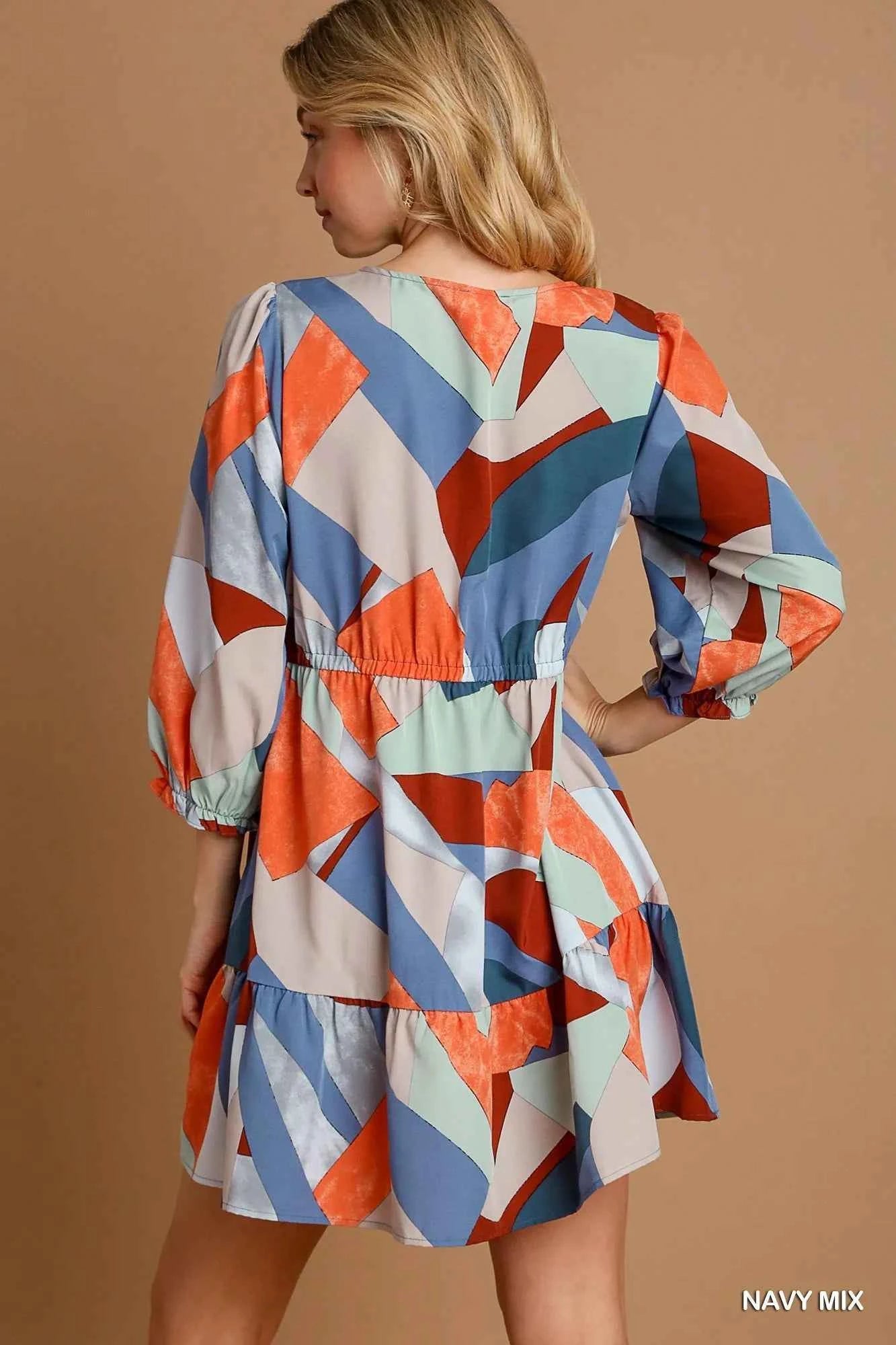 Umgee Abstract V-Neck Tiered Printed Dress ae2b6ef0-fee1-48e4-bfa5-1b45210d2429-Max-Origin