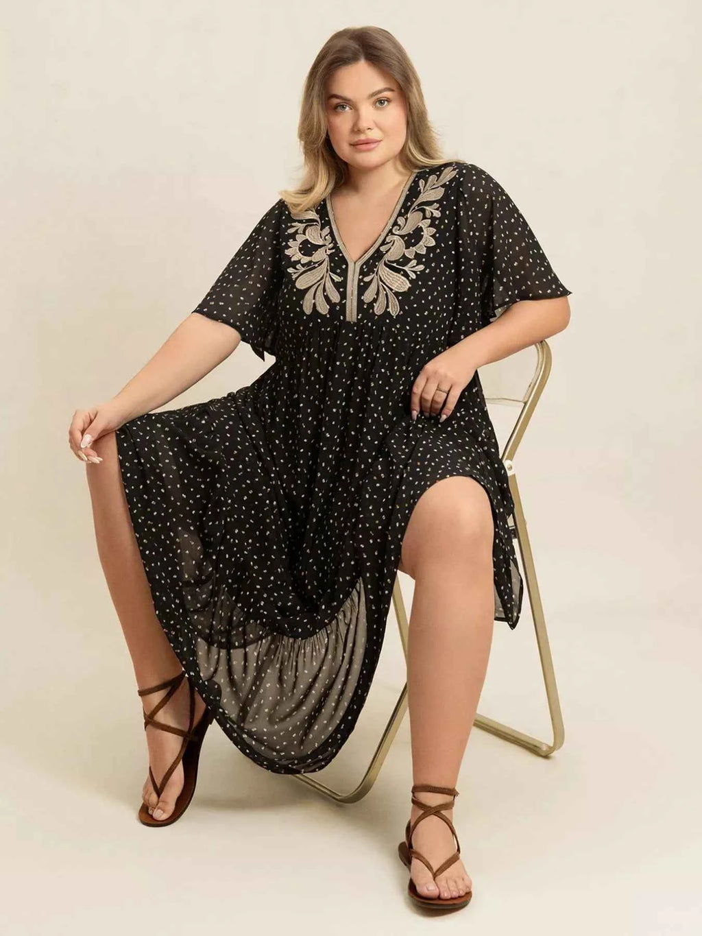 Plus Size Printed V-Neck Flutter Sleeve Maxi Dress afc92e84-3fe6-4067-b392-6b38d22563b8-Max-Origin