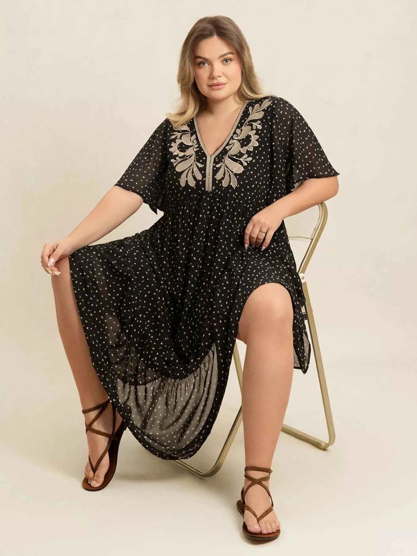 Plus Size Printed V-Neck Flutter Sleeve Maxi Dress afc92e84-3fe6-4067-b392-6b38d22563b8-Max-Origin