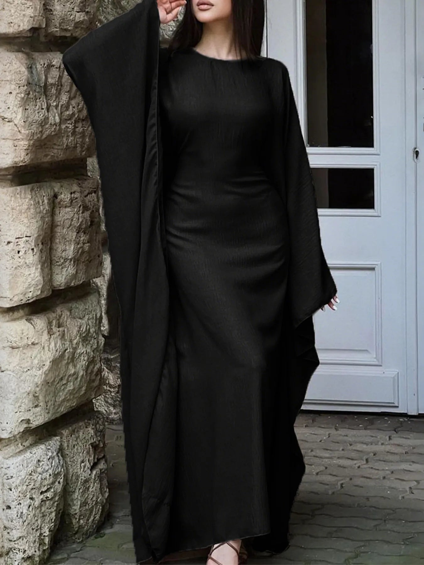 Round Neck Maxi Dress with Flowing Cape Sleeves Black afd037ace59749fcbd63576fb51b4aa5-Max-Origin