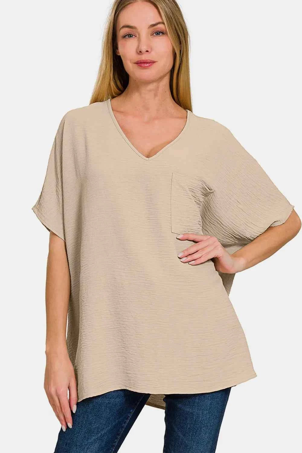 Full Size Texture V-Neck Short Sleeve Top b24f2643-0bfa-4df3-bda5-d6dfcd1a6c15-Max