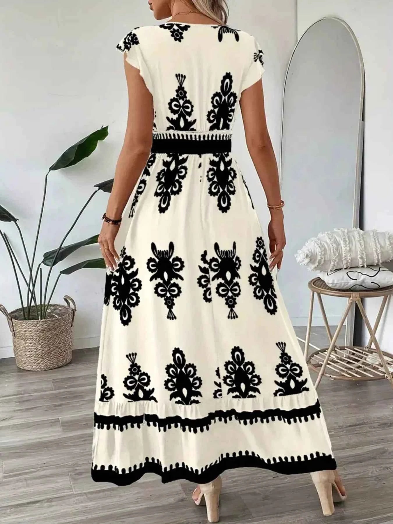 Printed V-Neck Ruffled Cap Sleeve Dress b73182d89c12457db8fbdde27fb821c8-Max-Origin