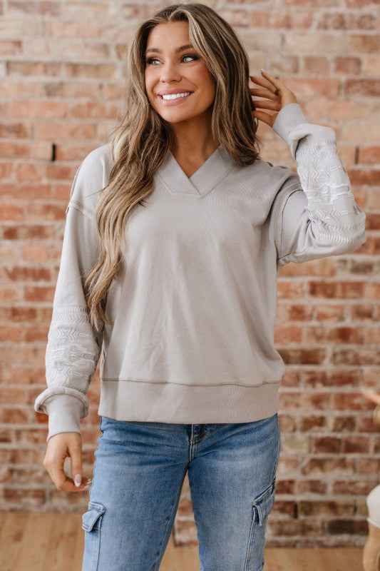 Western Aztec Embroidered Sleeve V-Neck Sweatshirt be00e116-5784-4e5f-bbb8-9d706fc8c2ef