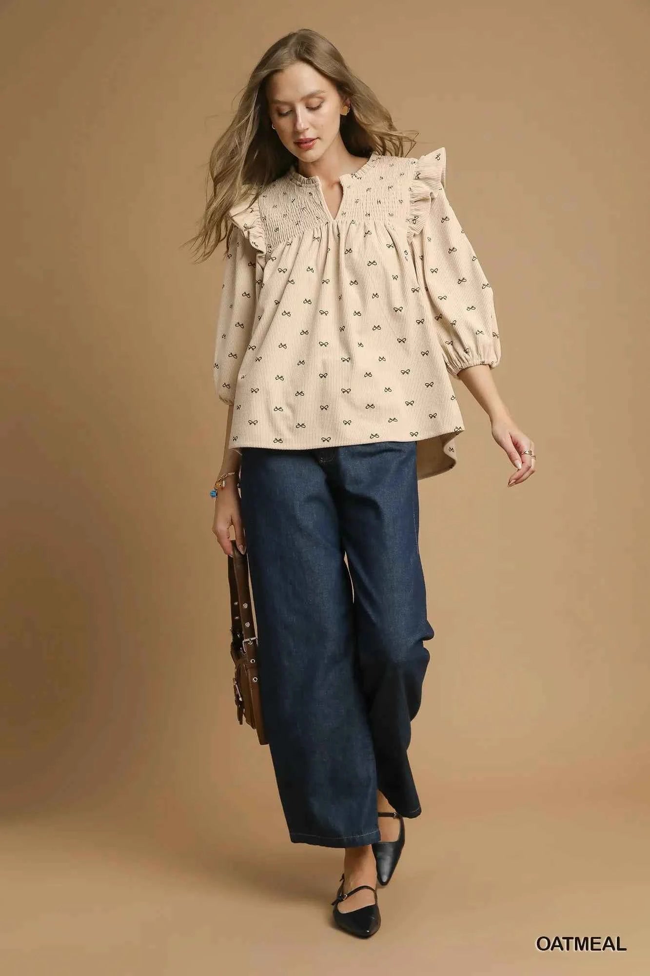 Umgee Bow Print Corduroy Puff Sleeve Blouse with Ruffled bf20e0a6-8cfb-4325-9c4b-dbf677b176b7-Max-Origin