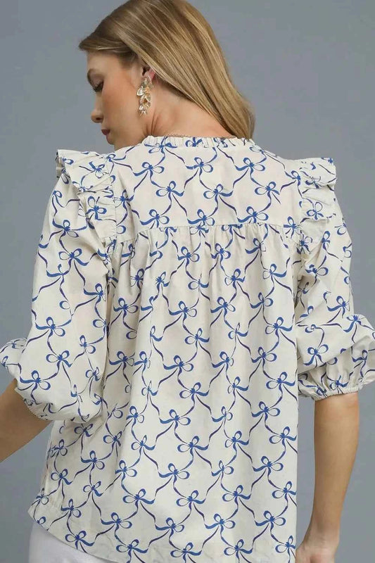Ruffled Bow Print Notched Blouse c0354e35-e7af-44d1-b57c-0d30b5868442-Max-Origin