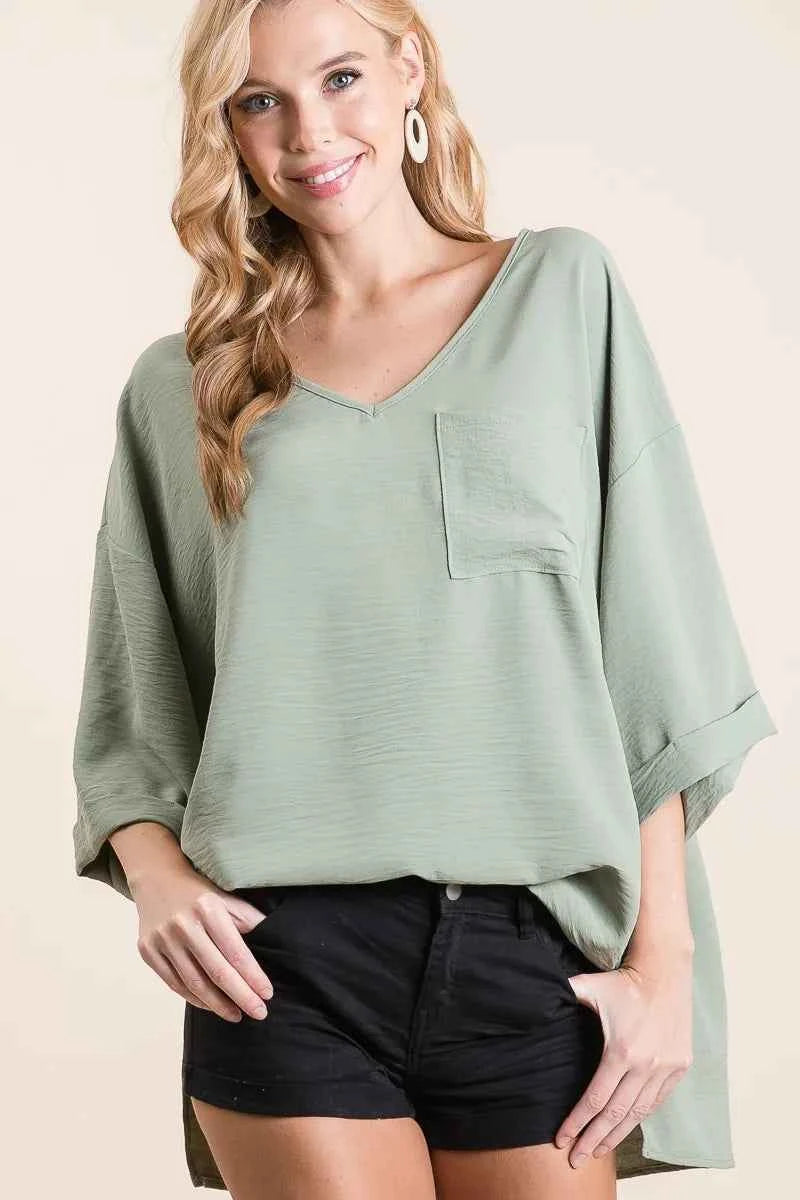 Flowy Woven V-Neck Top with Rolled Up Cuffs c070503da875469db16b63cba83280d3-Max-Origin