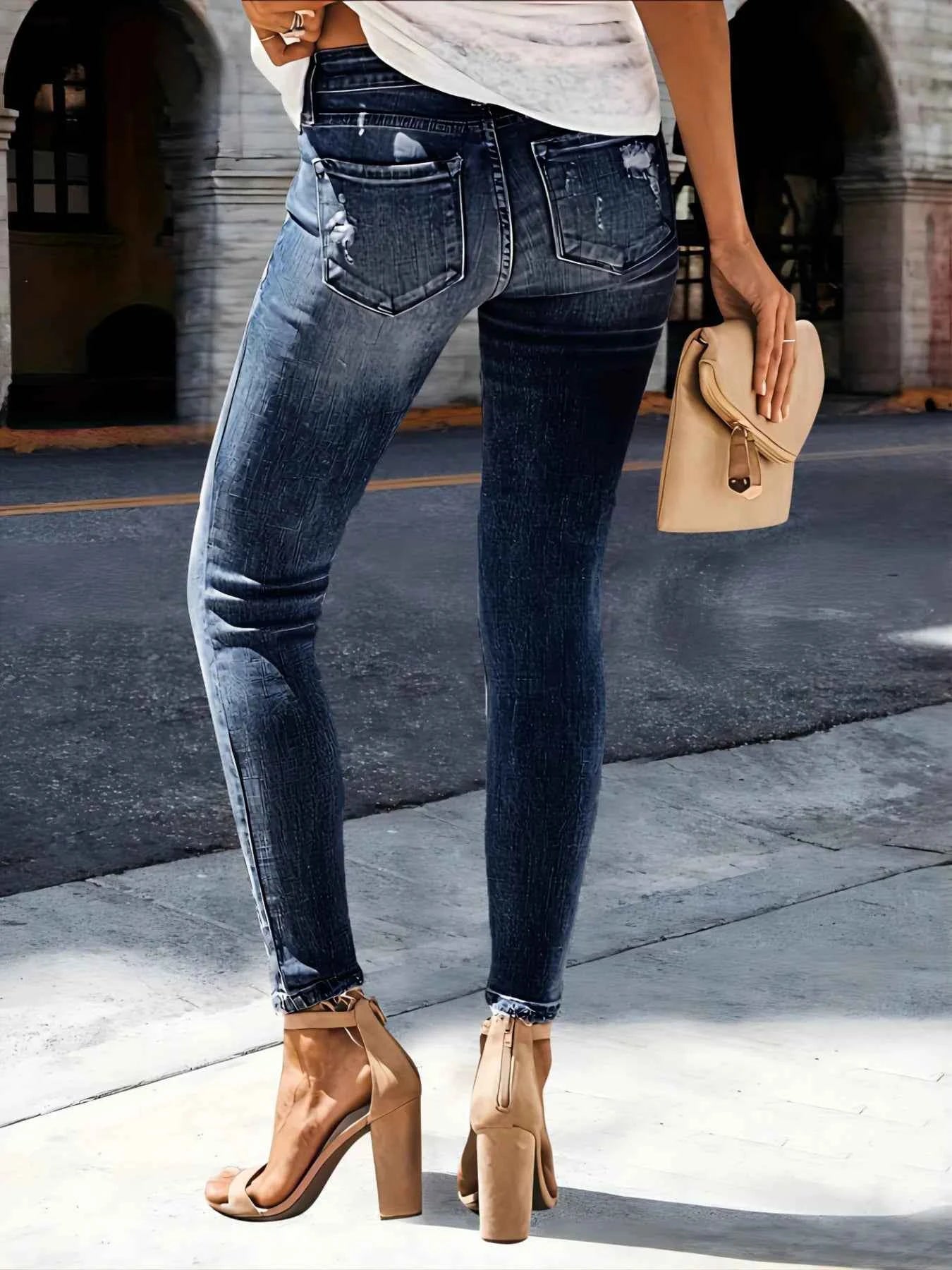 Distressed Skinny Jeans c0e65afeddc9486e8735cfd2cb95c527-Max-Origin