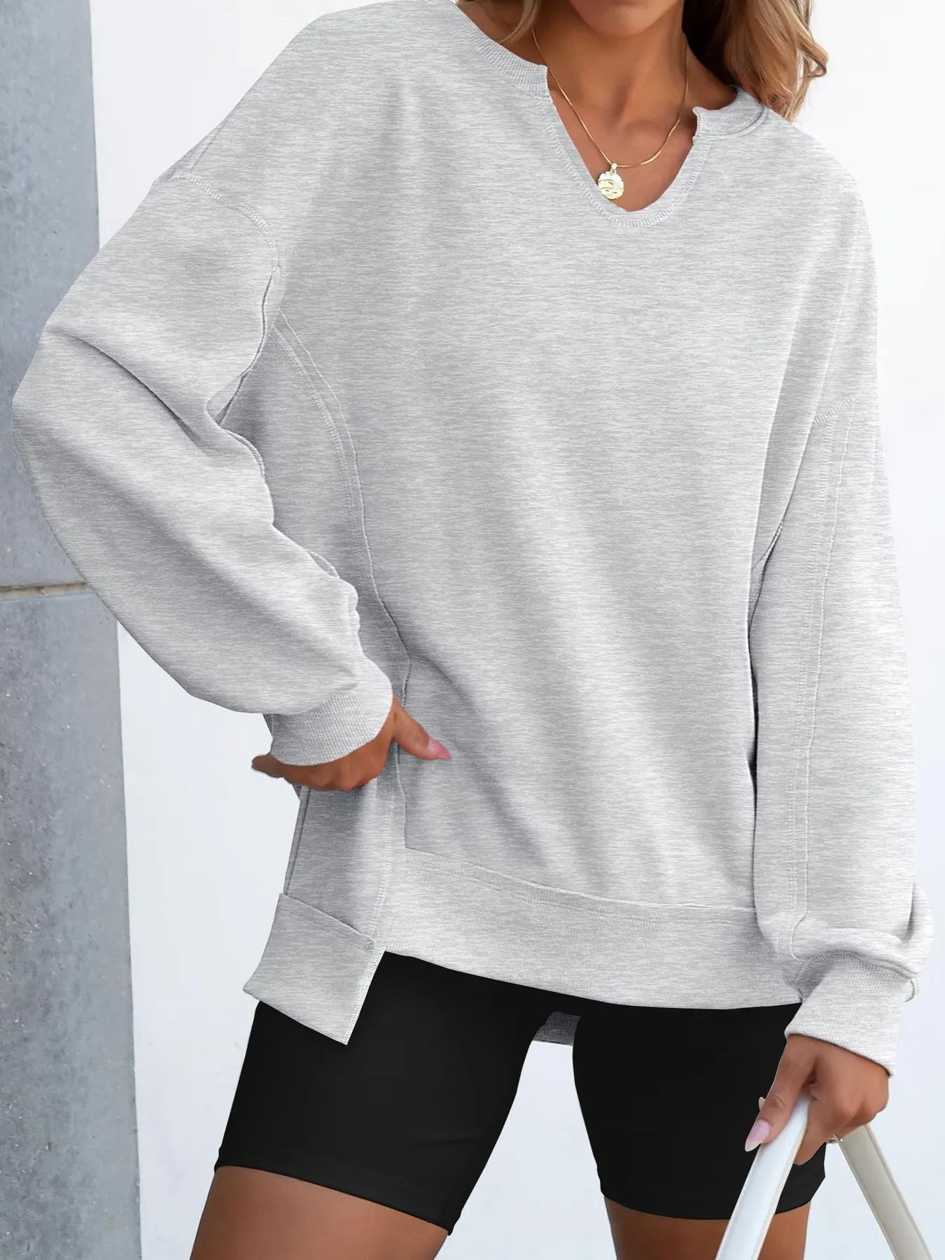 Notched Long Sleeve Oversized Sweatshirt c0e8834f6f3c4ec5bda8948948eb8a09-Max-Origin