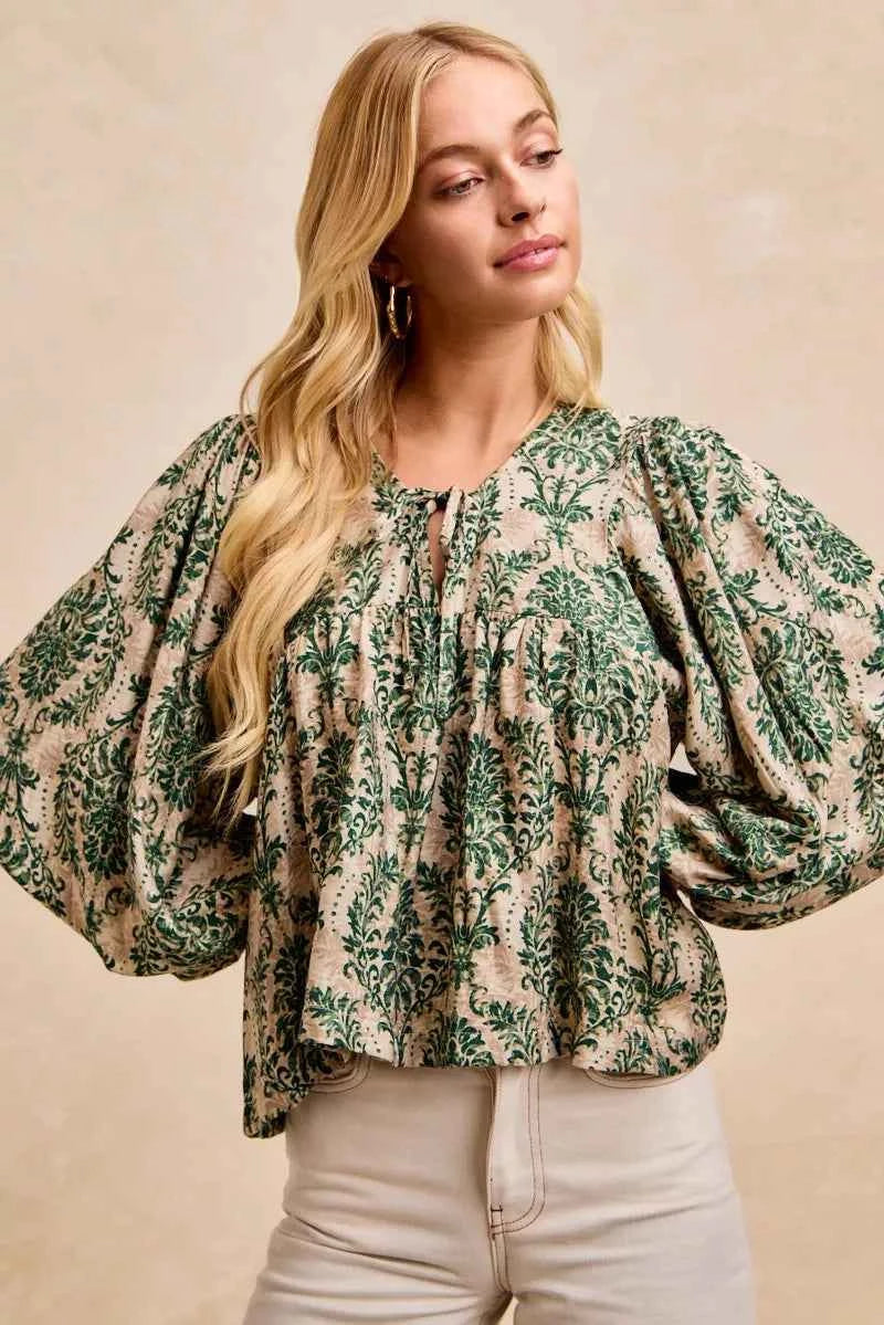 BiBi Printed Woven Front Tied Blouse with Baloon Sleeve c29679ad701b464780a0964ec1131bbb-Max-Origin