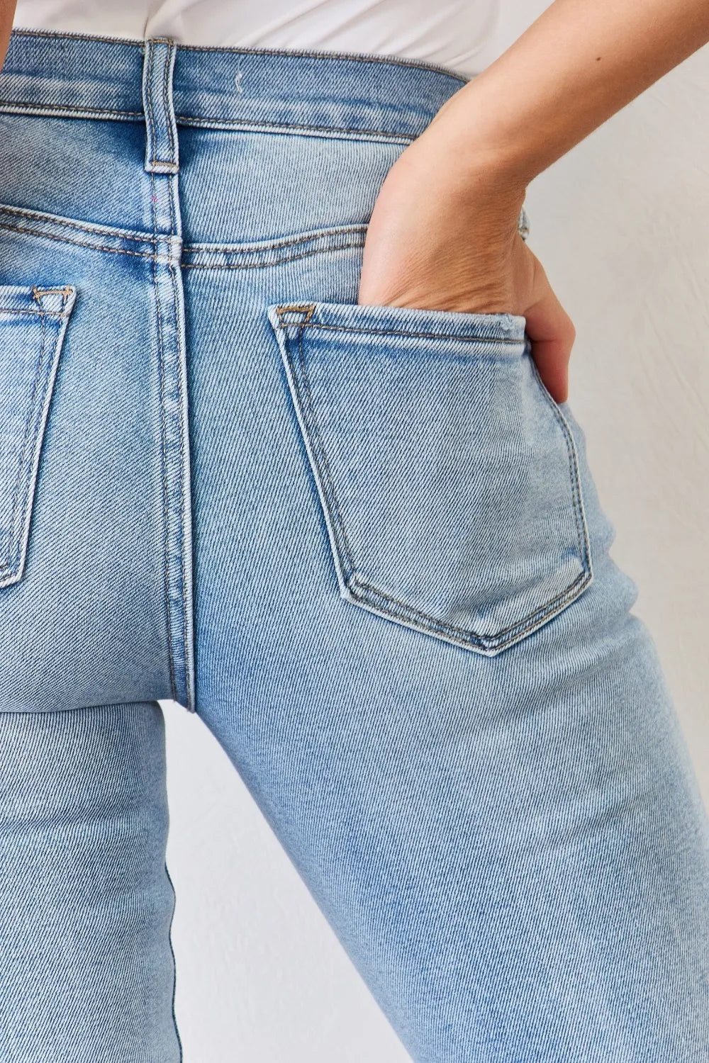 Kancan Full Size Mid Rise Y2K Slit Bootcut Jeans c31adf66-027b-4a0c-894e-d7007147c20a-Max