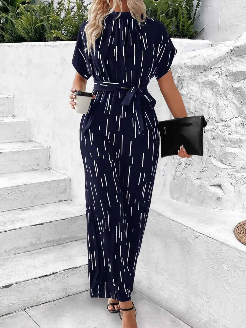 Tied Printed Mock Neck Wide Leg Jumpsuit c363054f-2950-4c04-a9fd-50bad08bdba5-Max