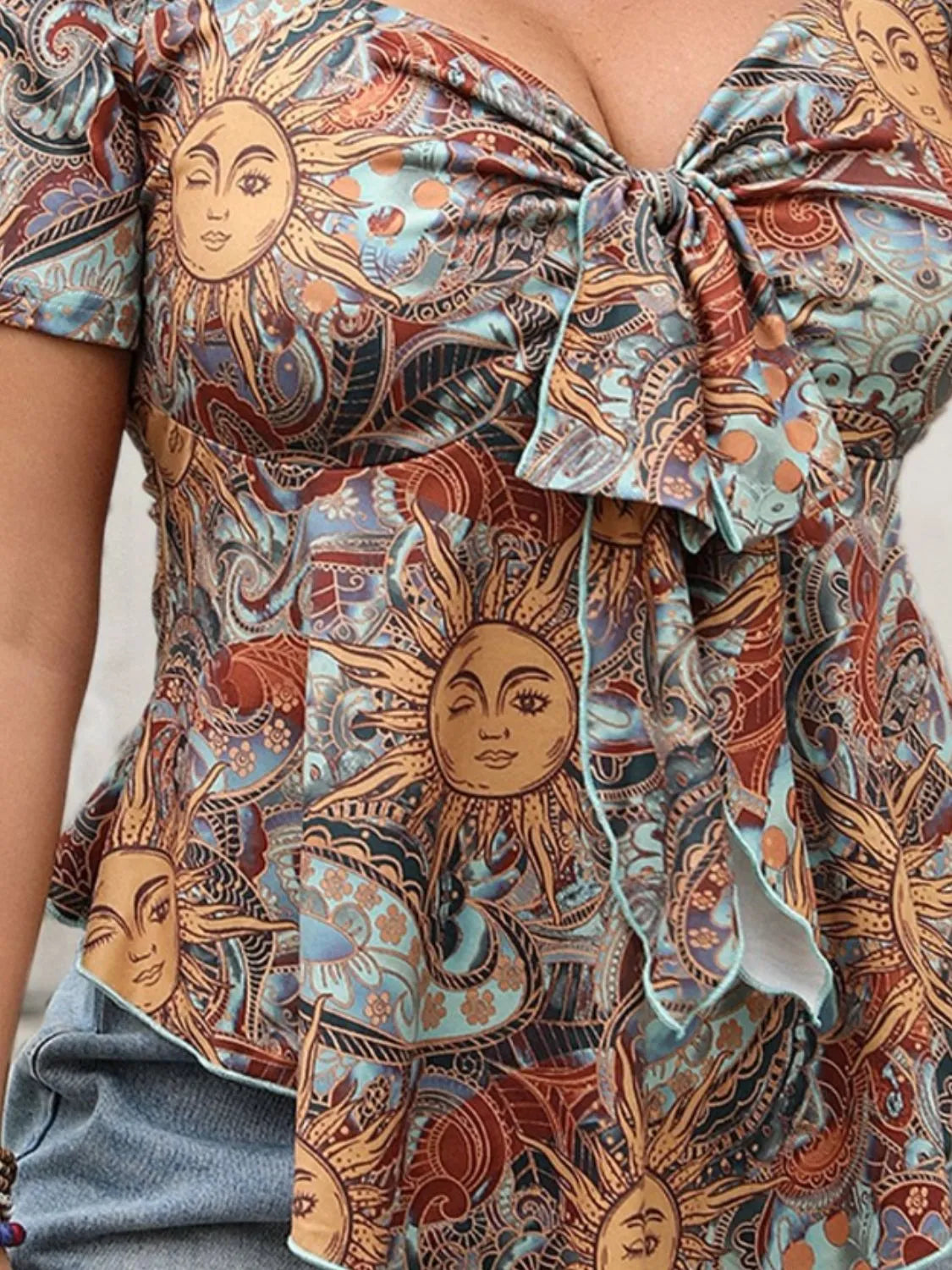 Plus Size Printed Sweetheart Neck Short Sleeve Blouse c36492db-4010-4450-b7bc-8e2733a27c58-Max-Origin