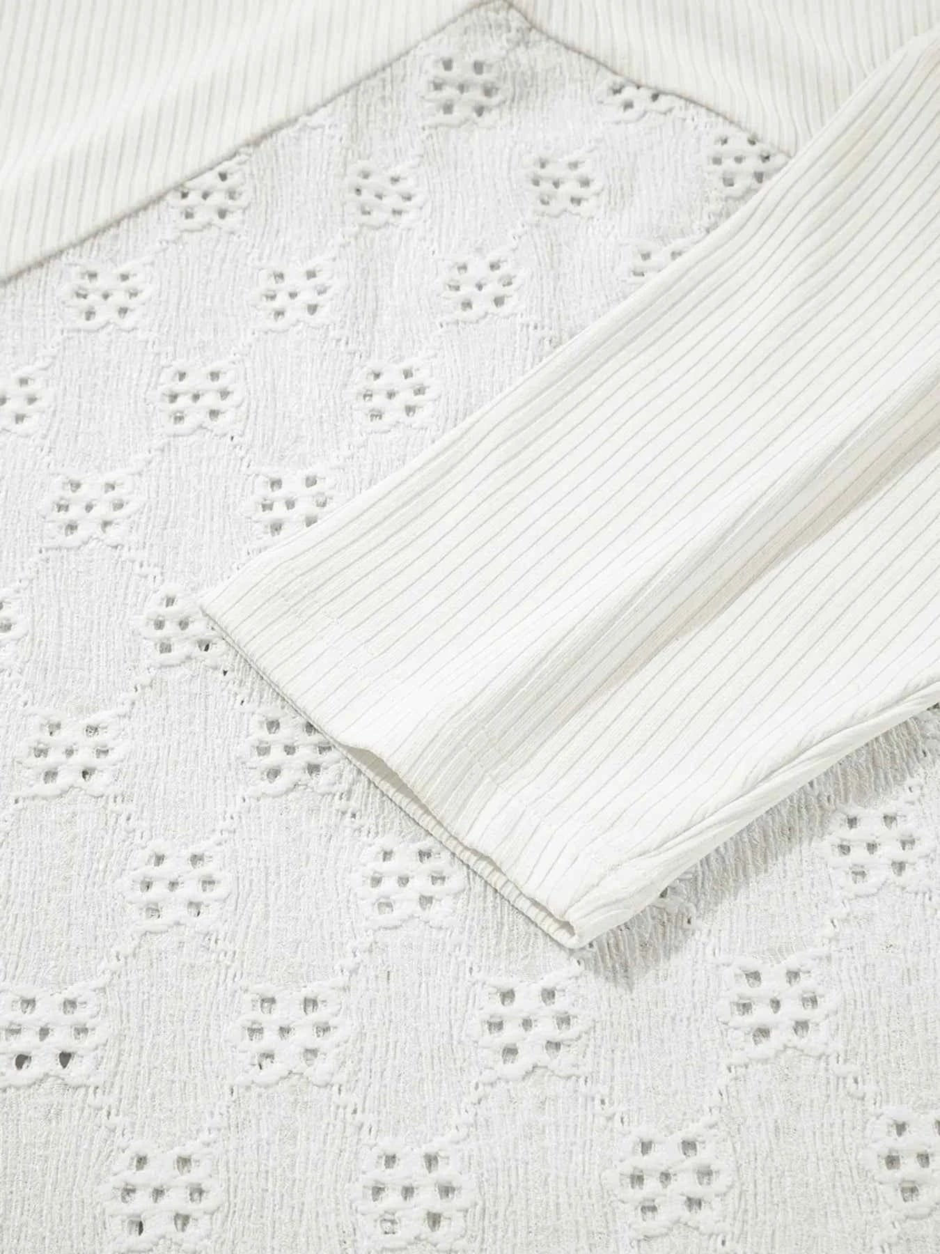 Eyelet Embroidered Loose V Neck Long Sleeve Top c3fc658e0b0c42abb3f85bca14b3c2bc-Max-Origin