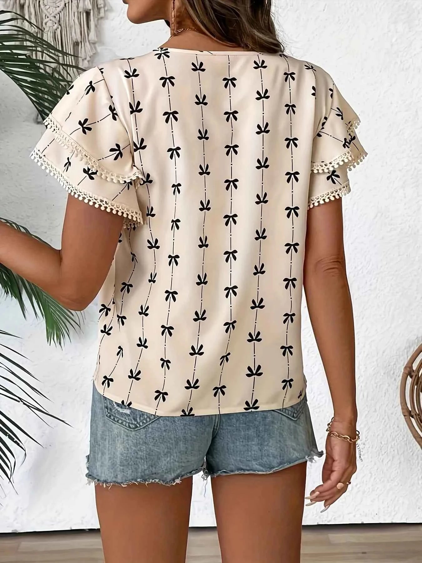 Bow Print Flutter Sleeve Blouse c46a20c166da4cf98142c60e1433d0b2-Max-Origin